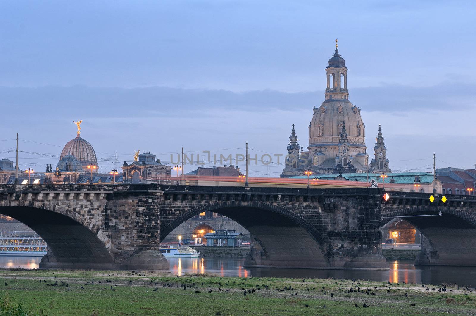 Dresden: view of the Frauenkirche and Augustus bridge from the other side of Elbe river