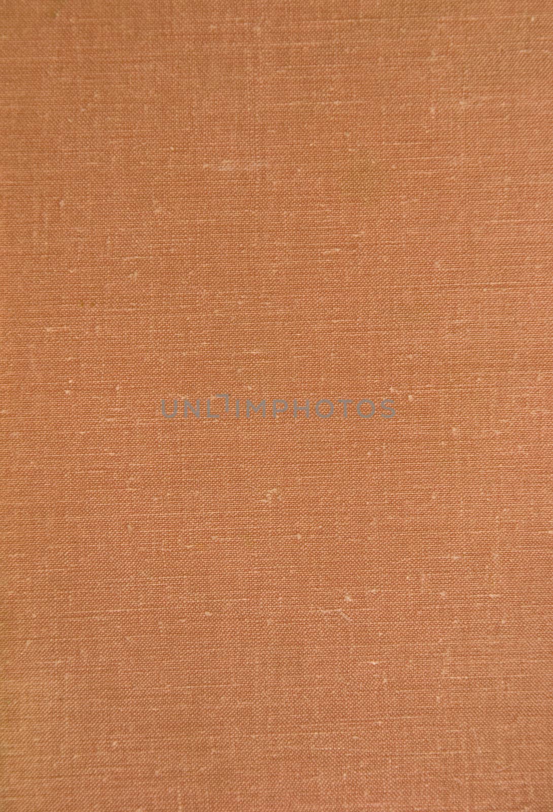 background of material covered old brown book paper cover.