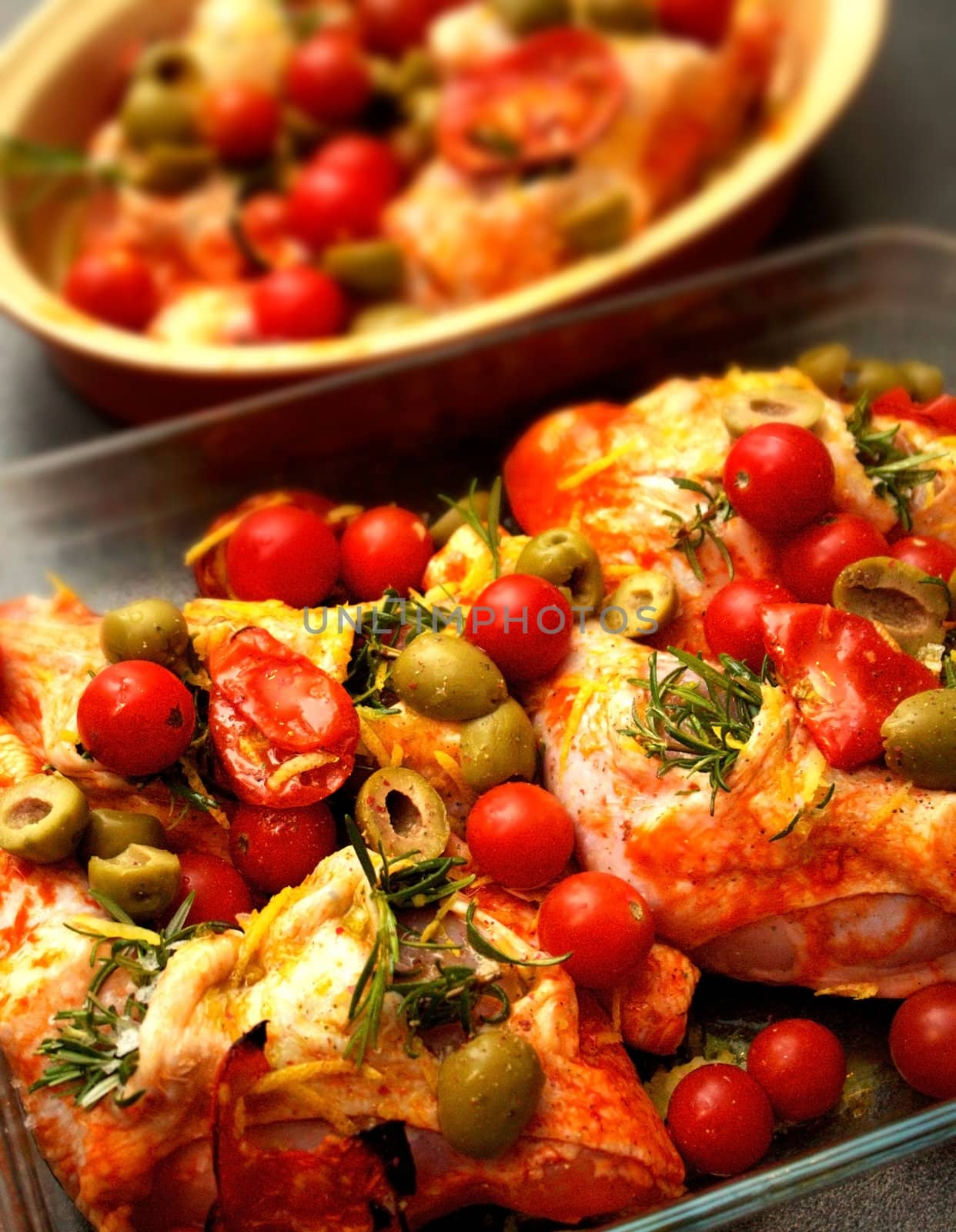 Chicken legs with tomatoes, olives and rosemary Italian style