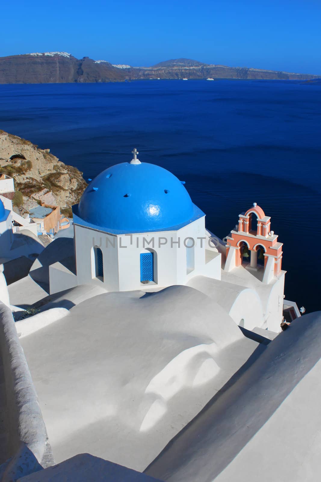 Traditional Greek blue cupola church in Oia Santorini Greece