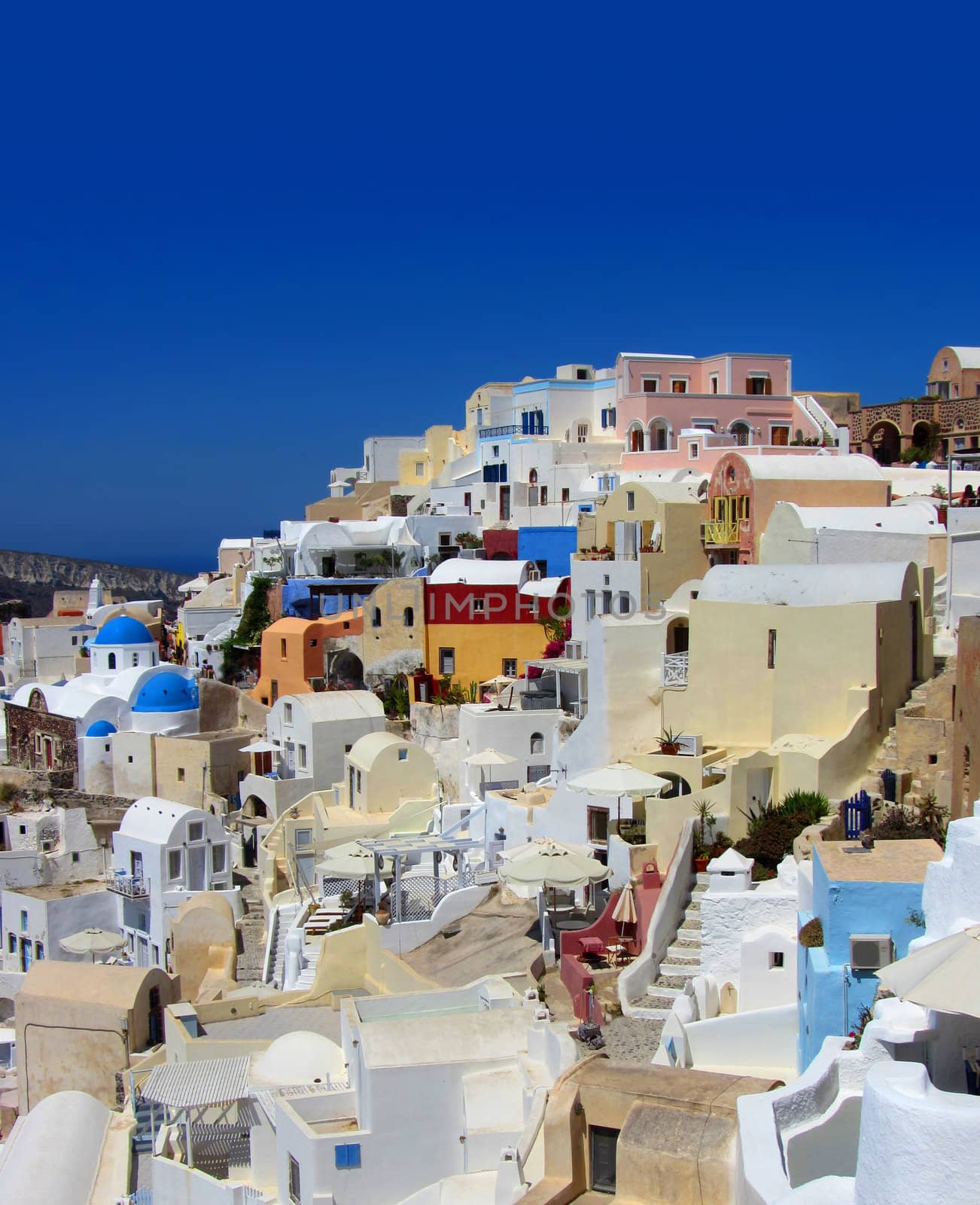 Colorful Greek village by anterovium