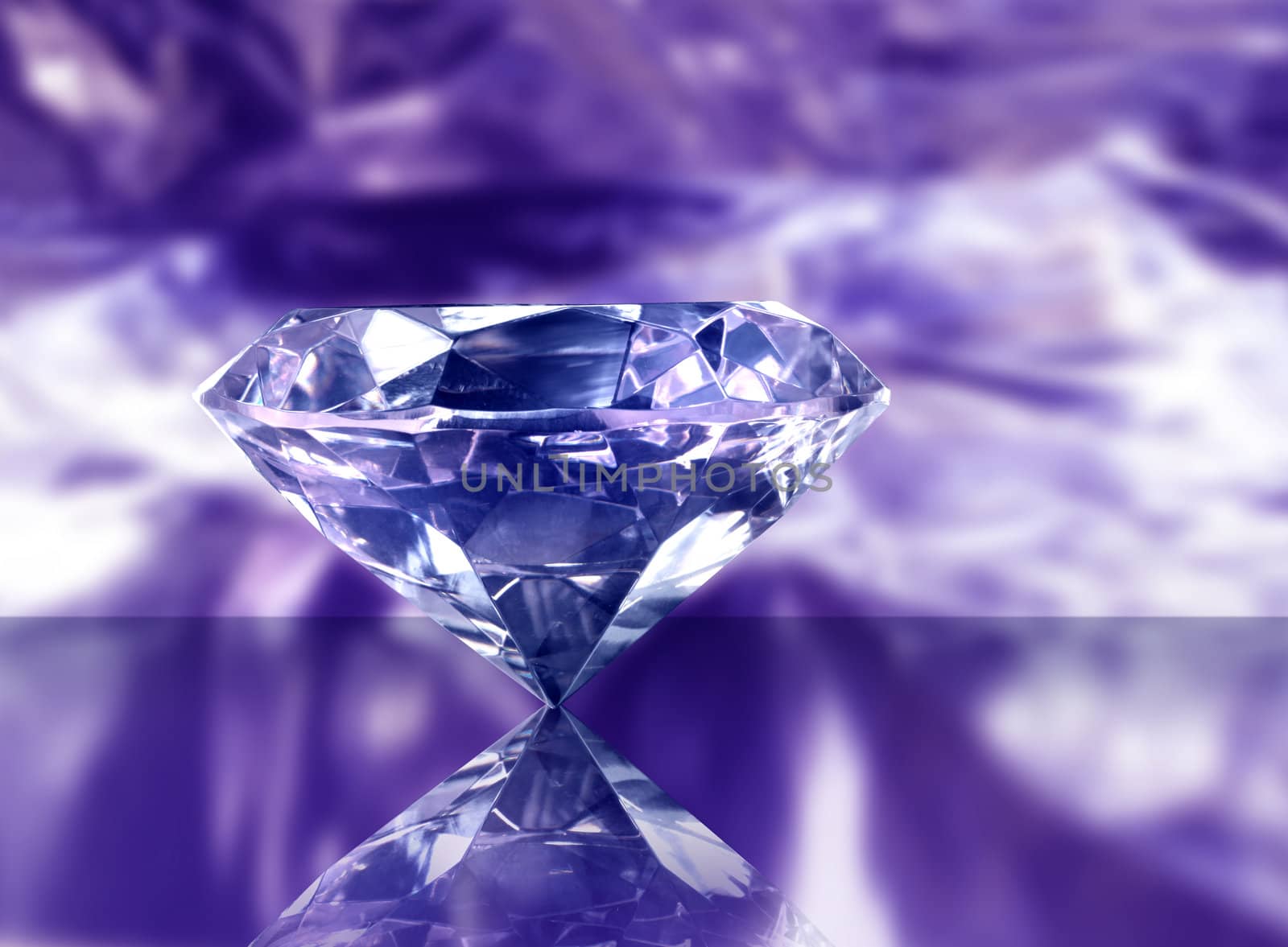 Big gemstone diamond on purple reflective background