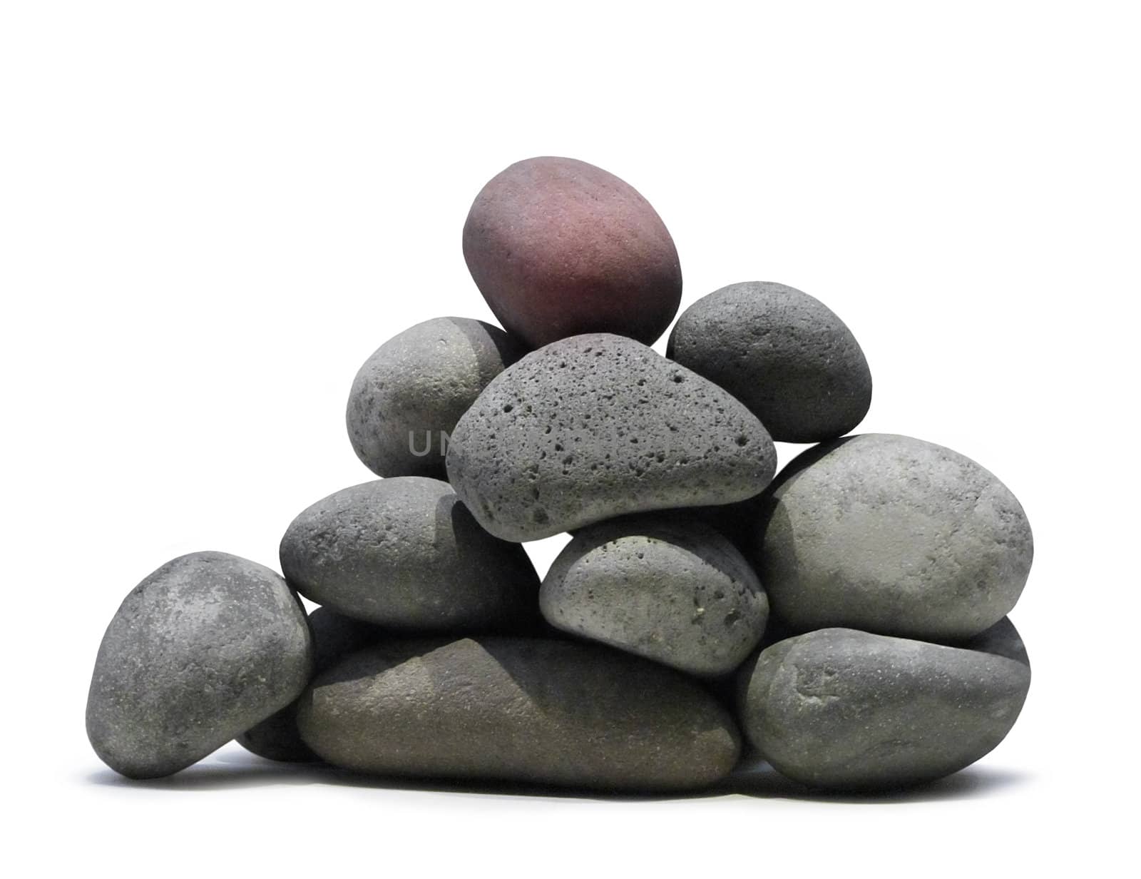 Smooth lava stones stacked pile on white background isolated