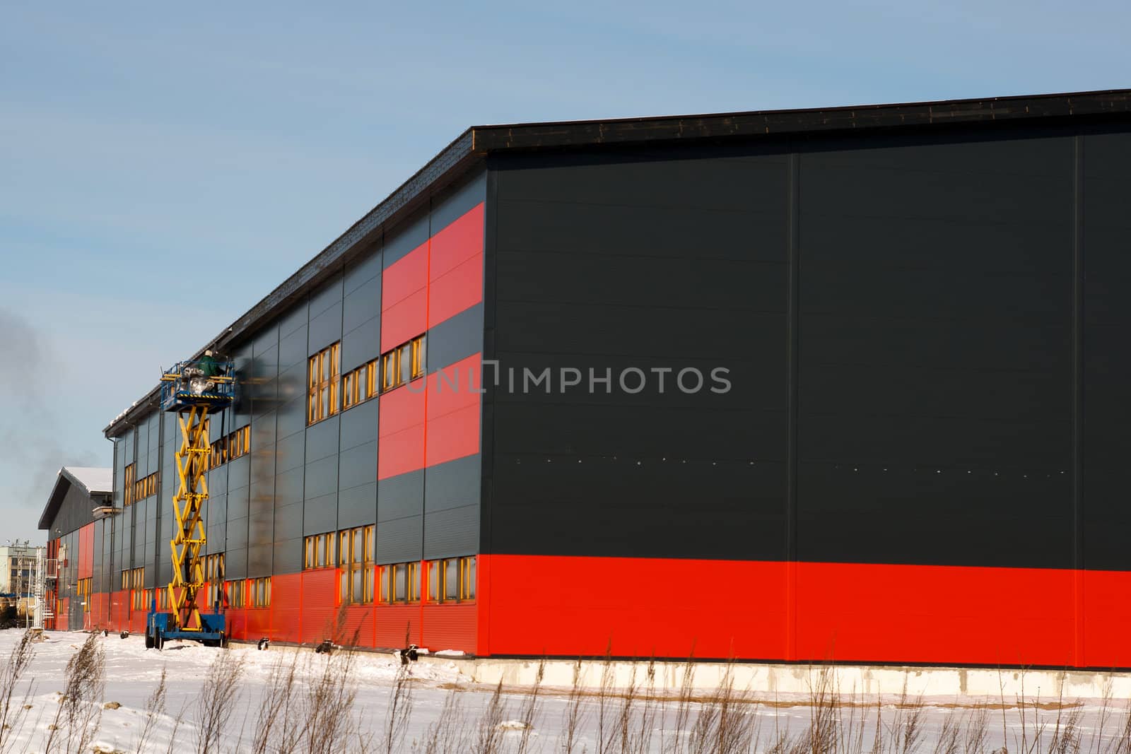 building new warehouse on a sunny winter day