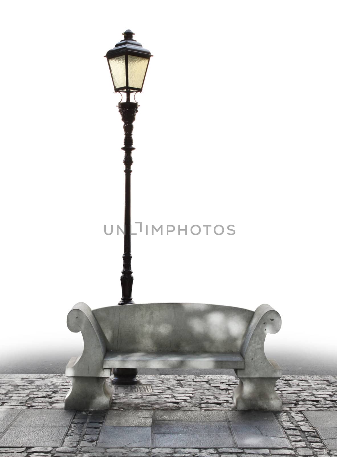 Marble bench seat and streetlight on stone paving, partly isolated