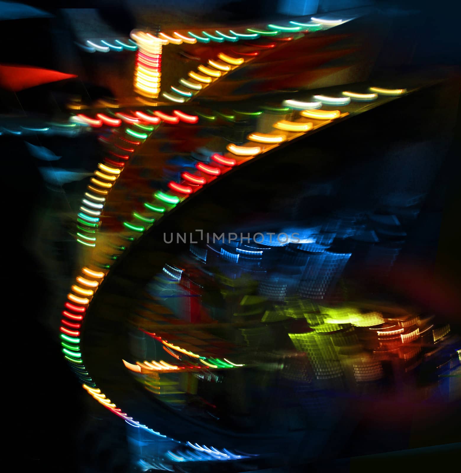 Colorful lights of urban surrounding blurred by motion