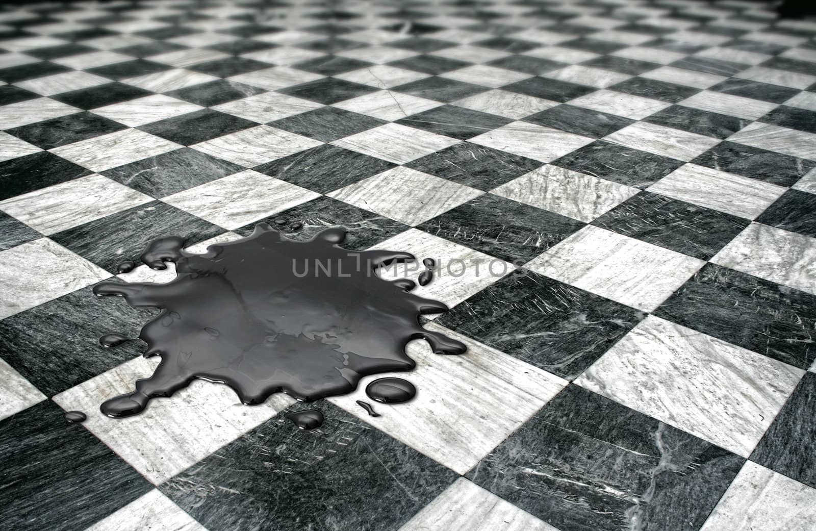 Black oil spilled on checkered marble floor