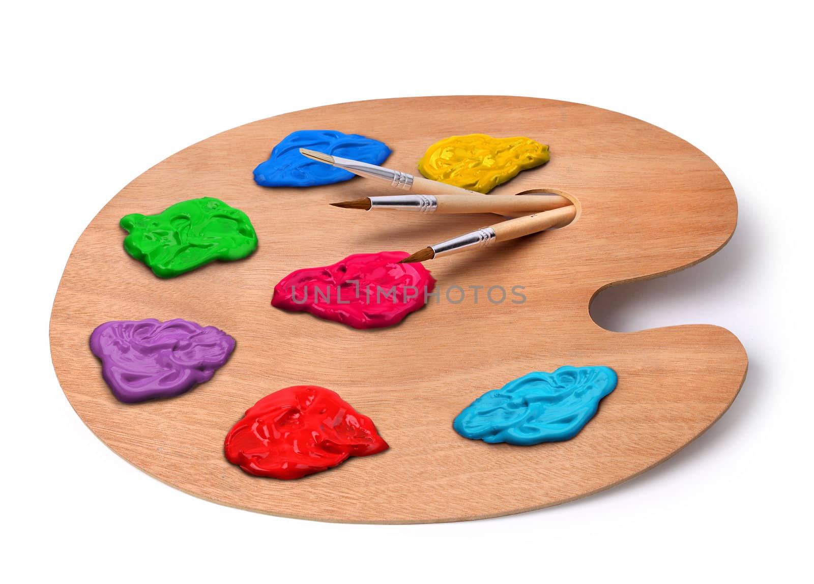 Wooden artist palette with brushes and colors isolated on white