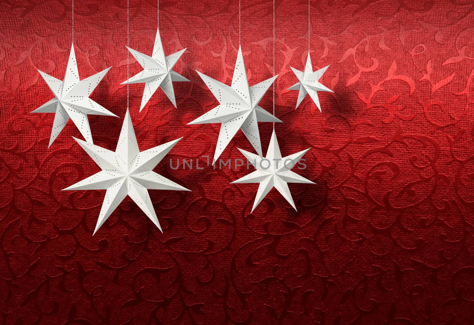 White paper stars on red brocade by anterovium