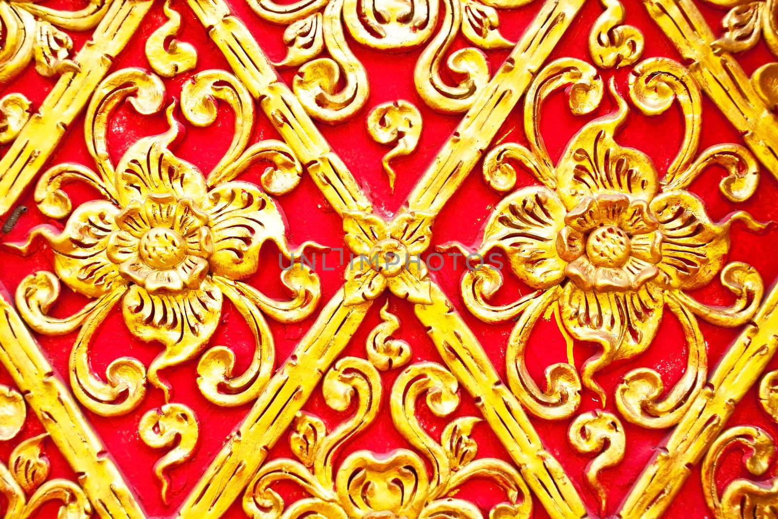 The gold stucco design of native thai style on the Wall by Yuri2012