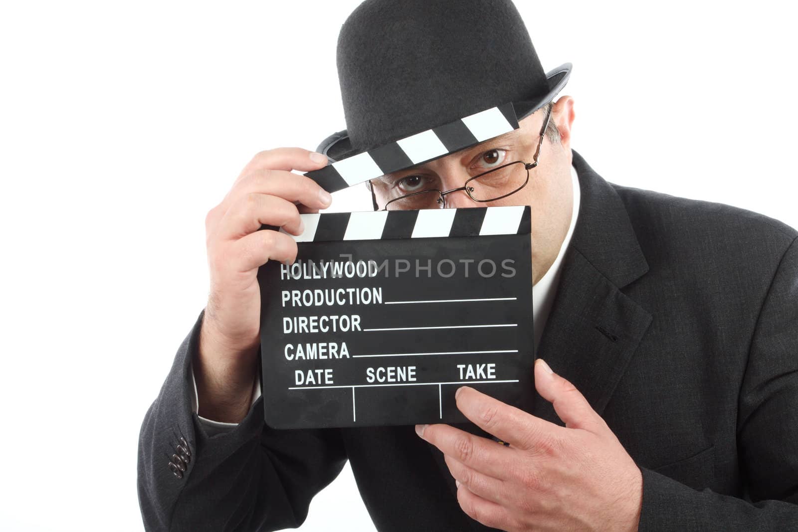 Old fashioned man holding movie clapboard 