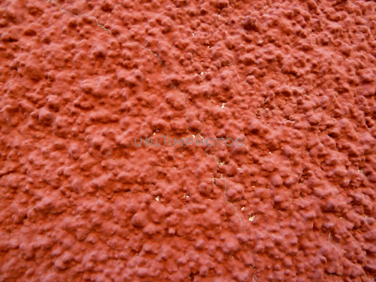 closeup on a section of a red textured surface