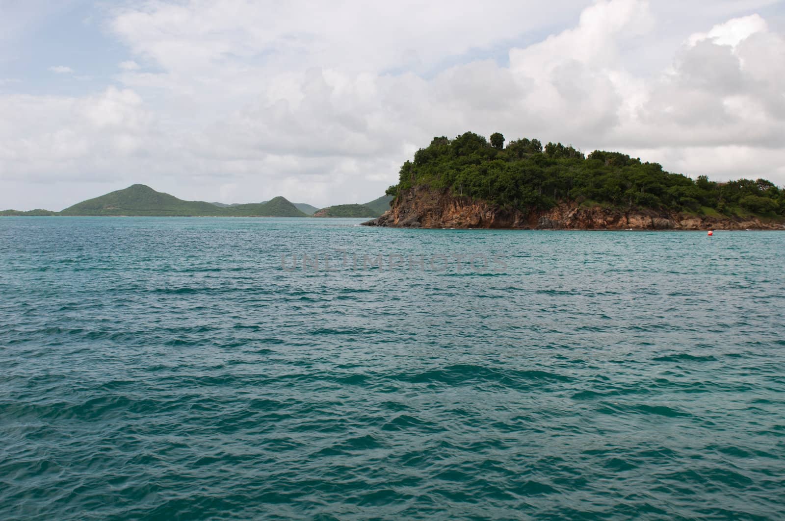 stunning Caribbean sea and mountainous landscape in Antigua (sea view and dramatic sky)