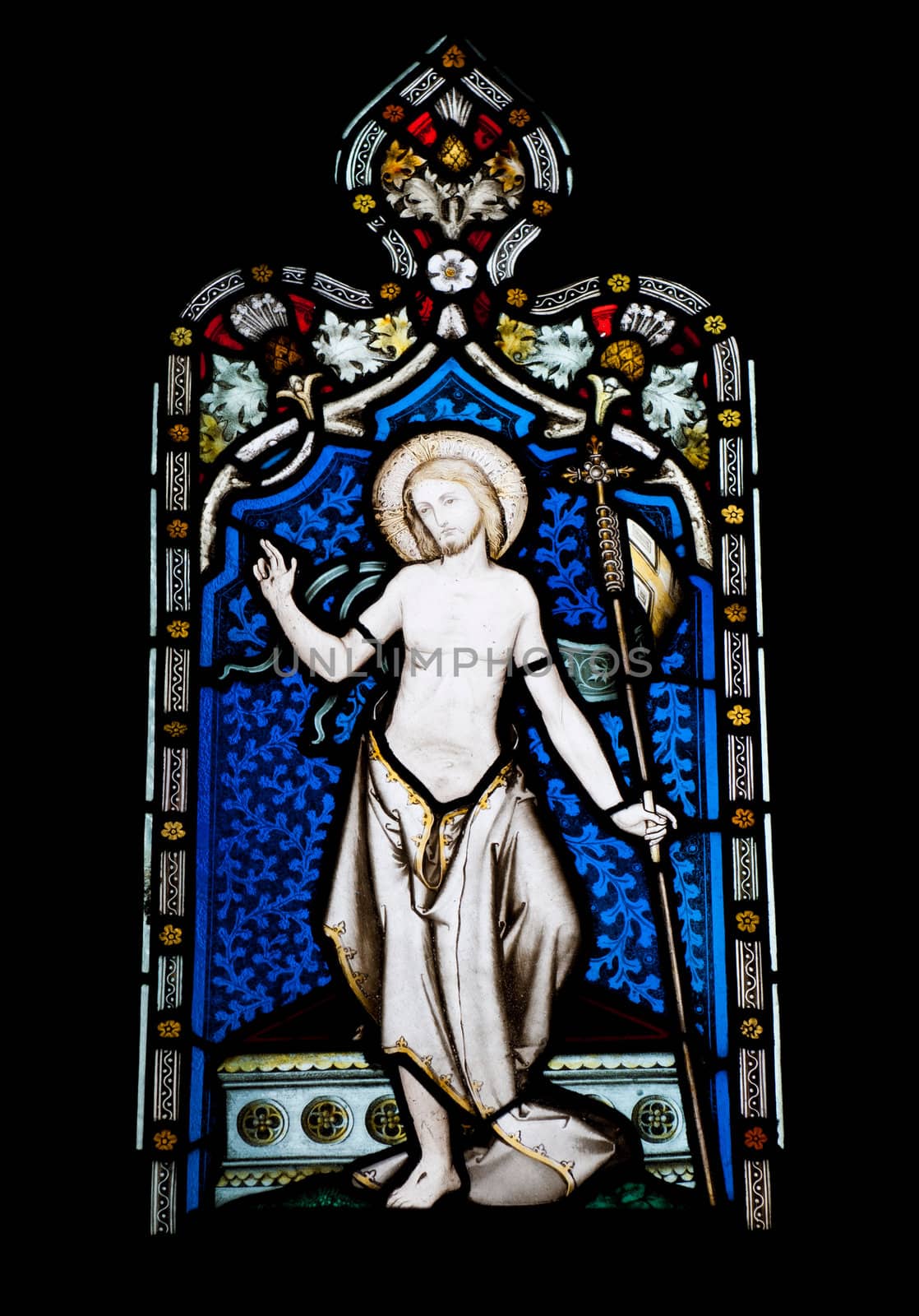 religious stained glass window in Gloucester Cathedral, England (United Kingdom) (isolated on black background)