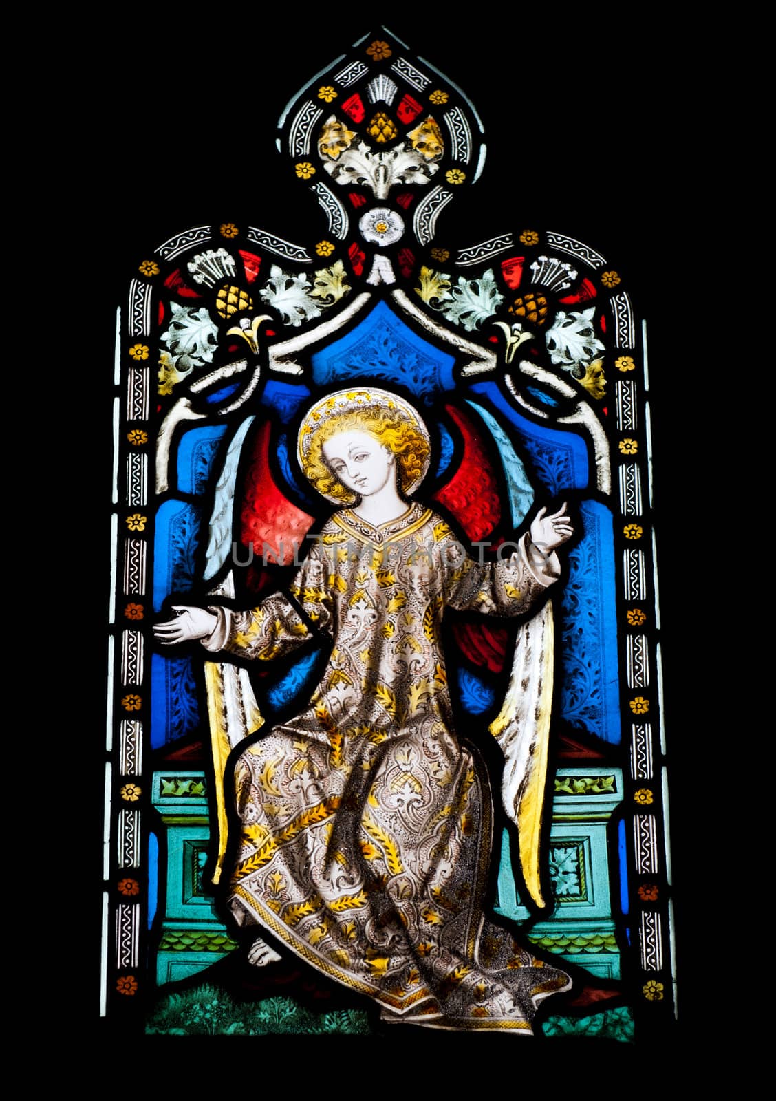 religious stained glass window in Gloucester Cathedral, England (United Kingdom) (isolated on black background)