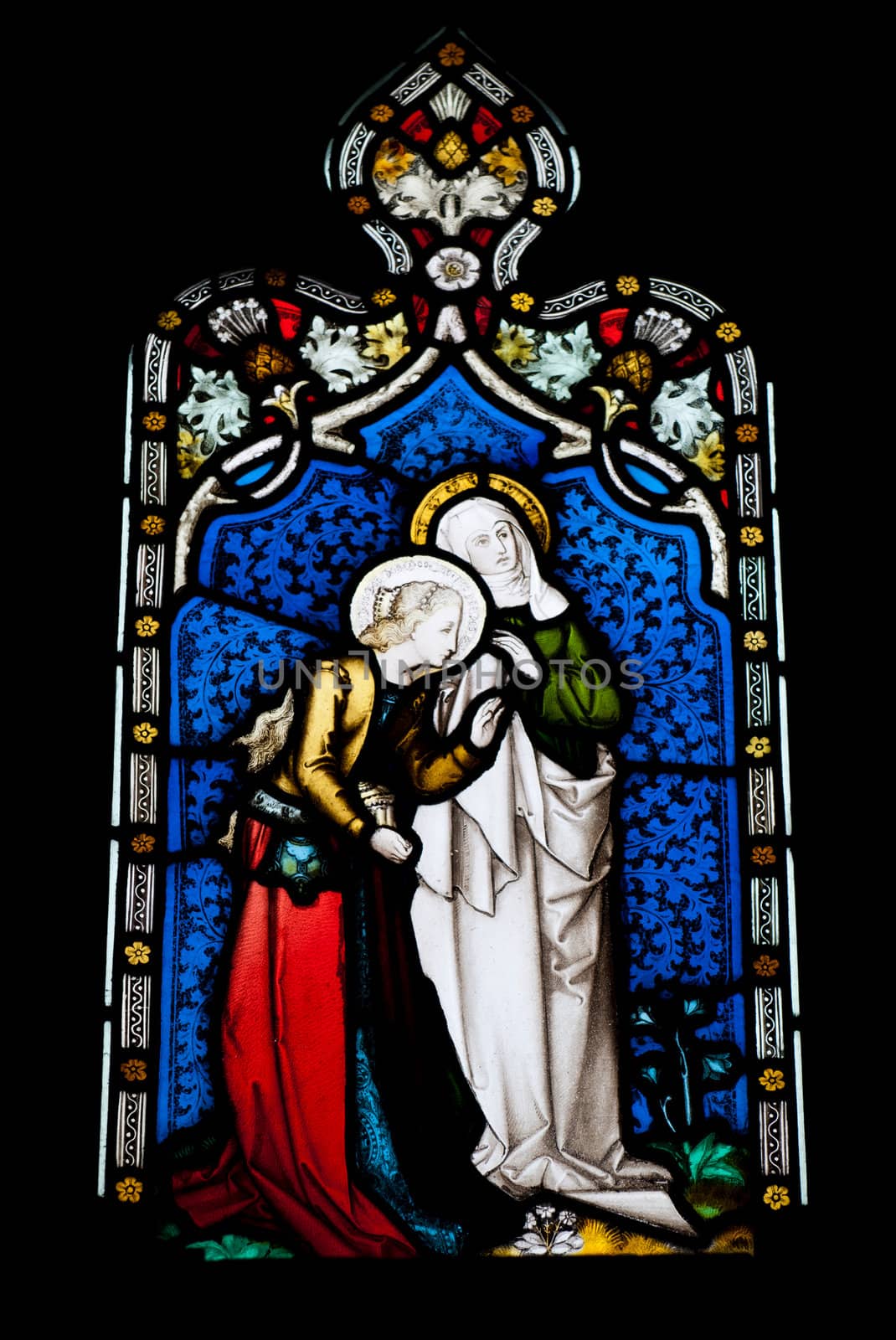 religious stained glass window in Gloucester Cathedral, England (United Kingdom) (isolated on black background)