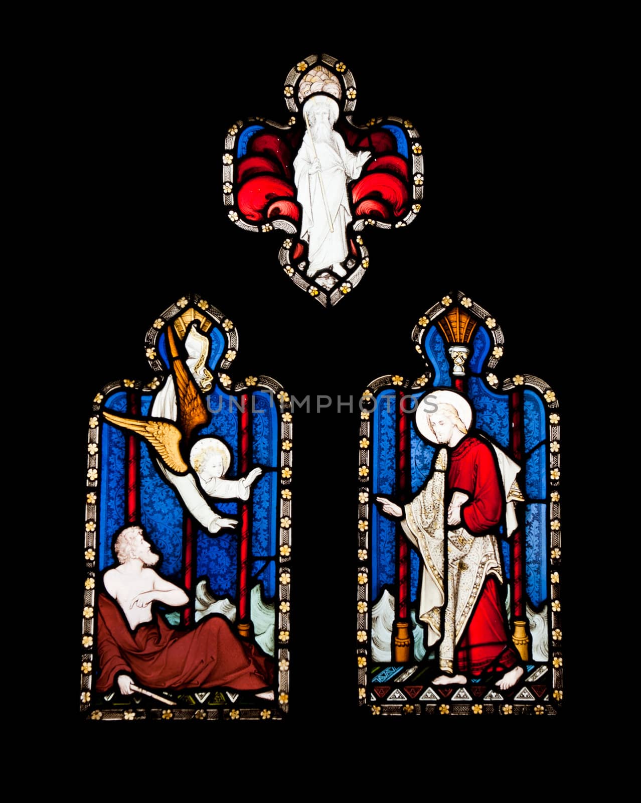 religious stained glass windows in Gloucester Cathedral, England (United Kingdom) (isolated on black background)