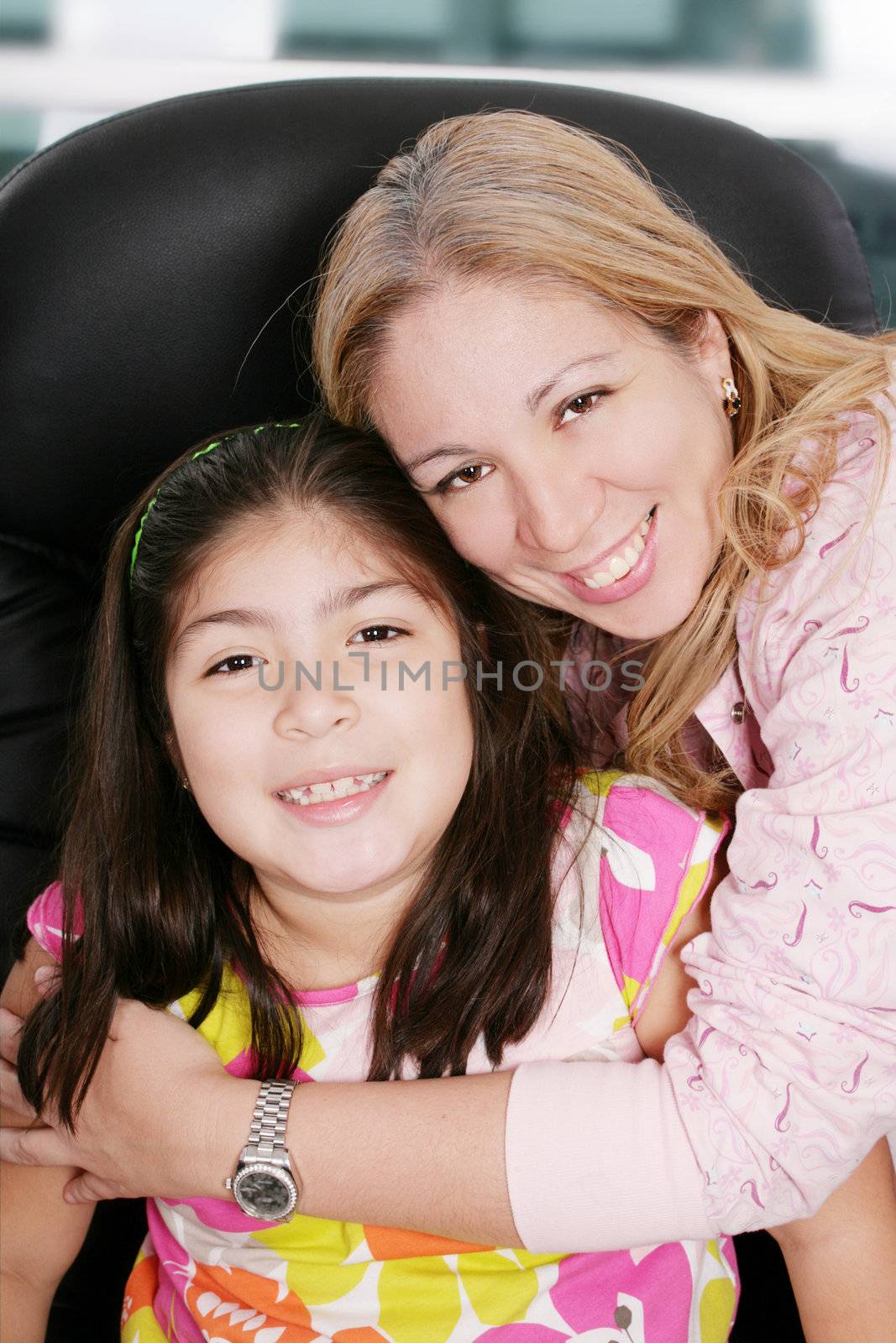 Close up of affectionate mother and daughter at home