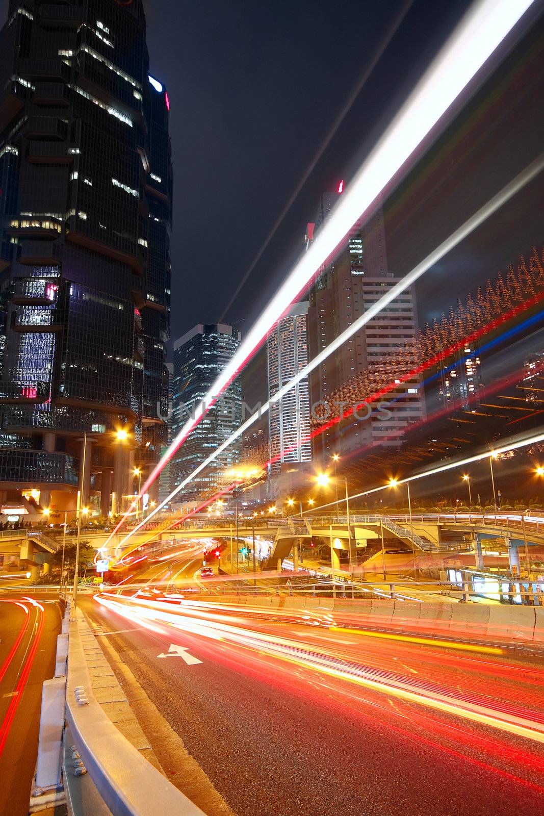 modern city traffic at night  by cozyta