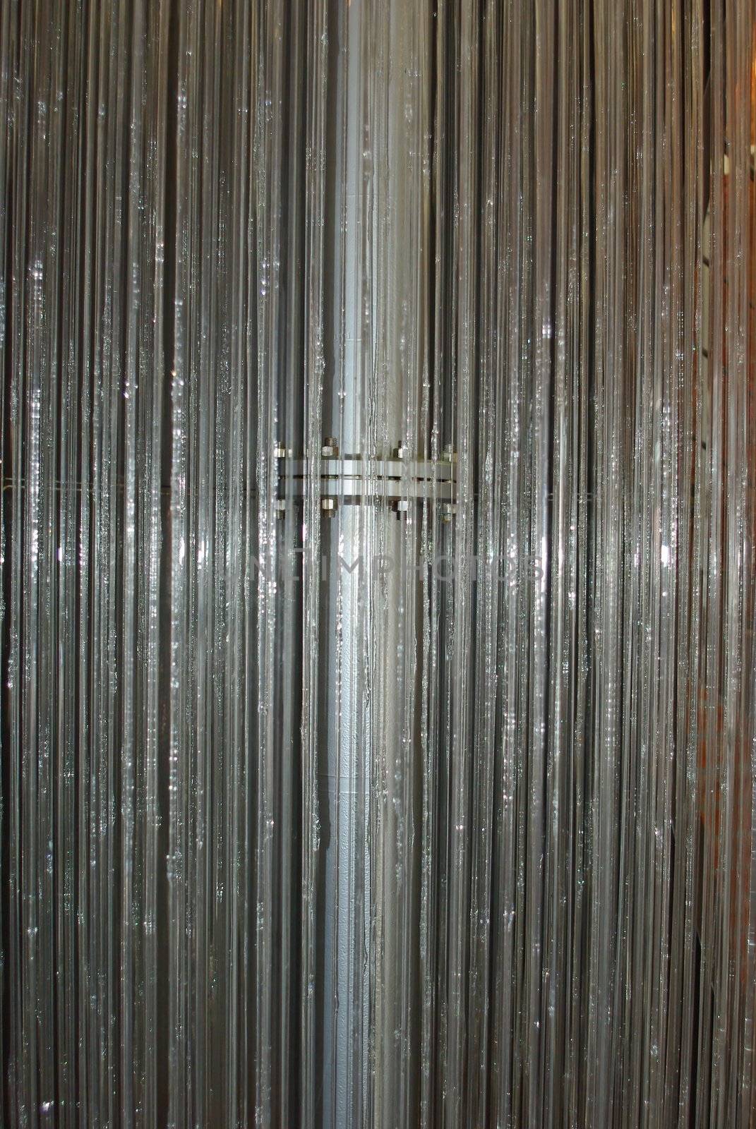 Water flowing down the threads. installation in the museum of sewage.