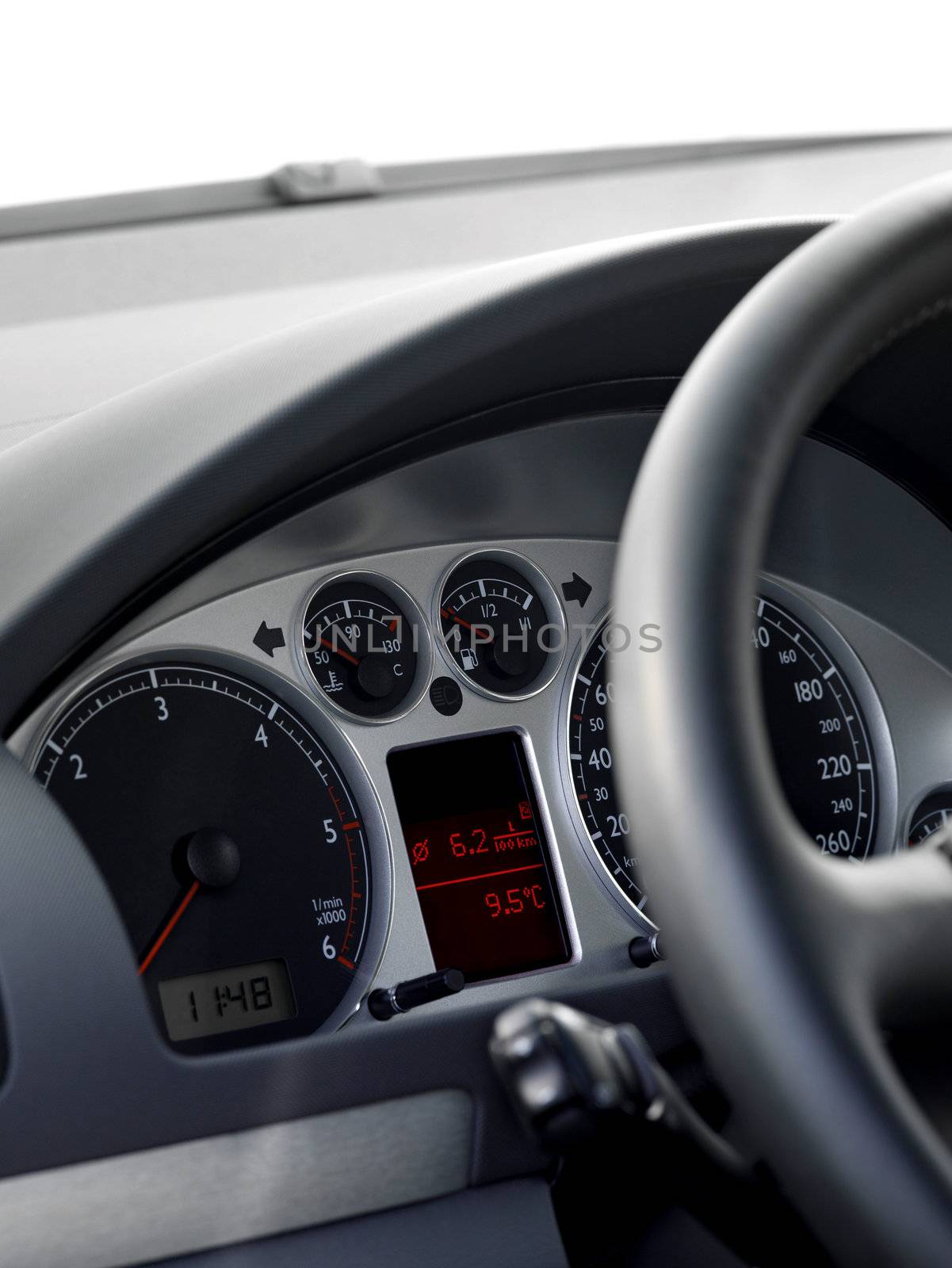 Modern car illuminated dashboard closeup, tachometer