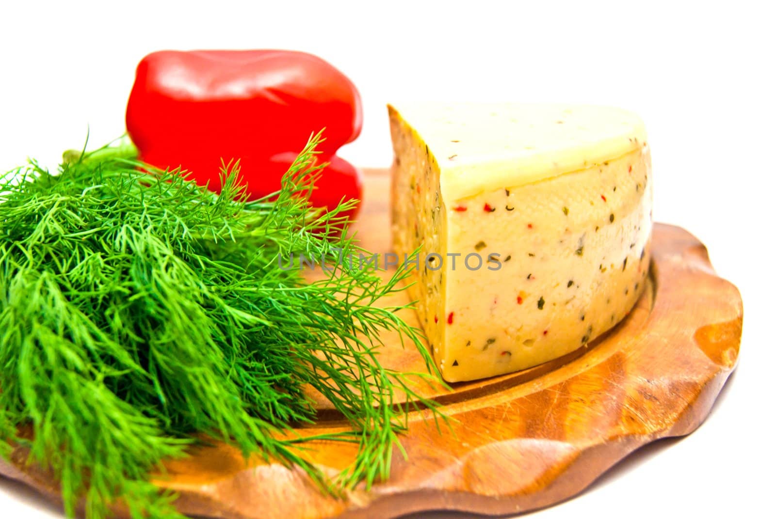 cheese with paprika and herbs on white
