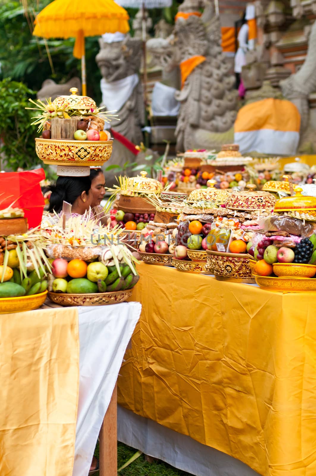 Offering in Bali Hindu temple by nvelichko