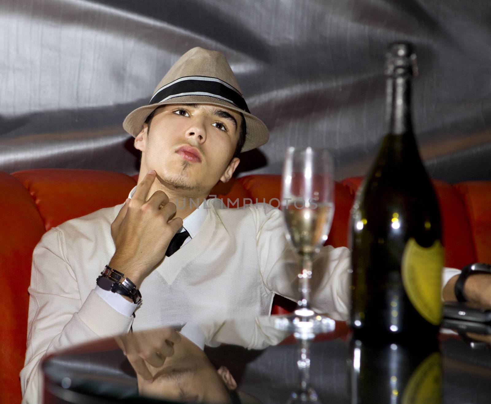man drinking champagne by ssuaphoto