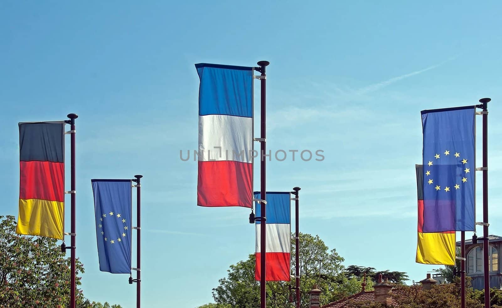 European flags blowing in the wind, commemoration of an event