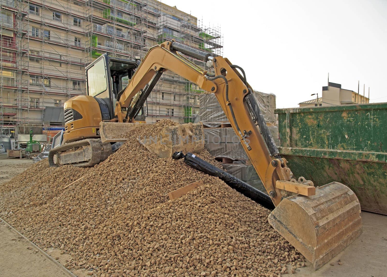 bulldozer on gravel, waiting for a next job