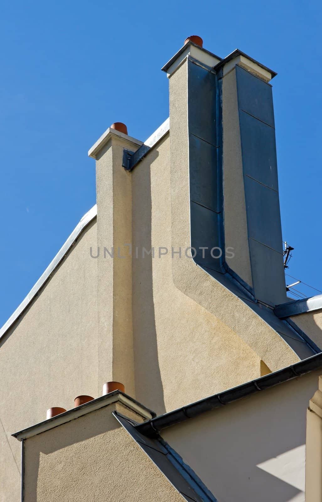chimneys and walls, forming a geometric structure  Paris France