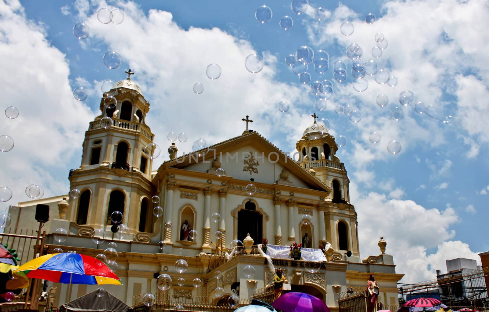 Plenty of bubbles flying across the Quiapo catholic church building in Manila.