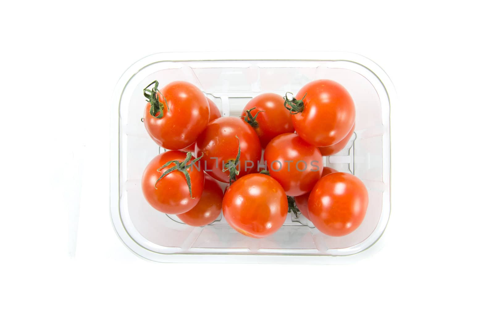 Picture of a bunch of cherry tomatoes in a box from a store