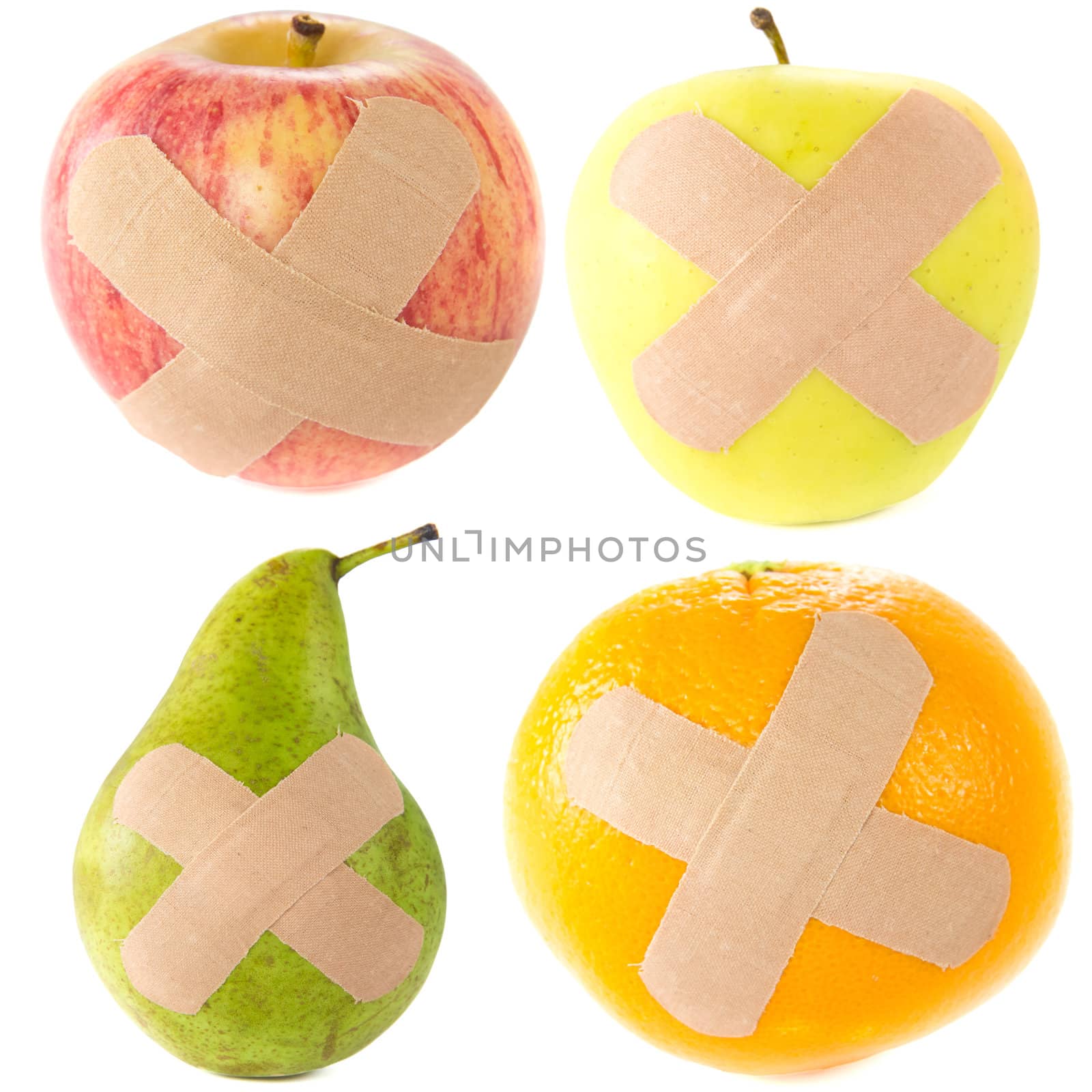 A picture of two apples, a pear, and a orange with bandages..Sick fruit..