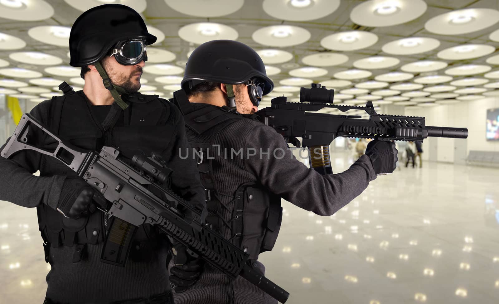 Defense against terrorism, two soldiers at an airport