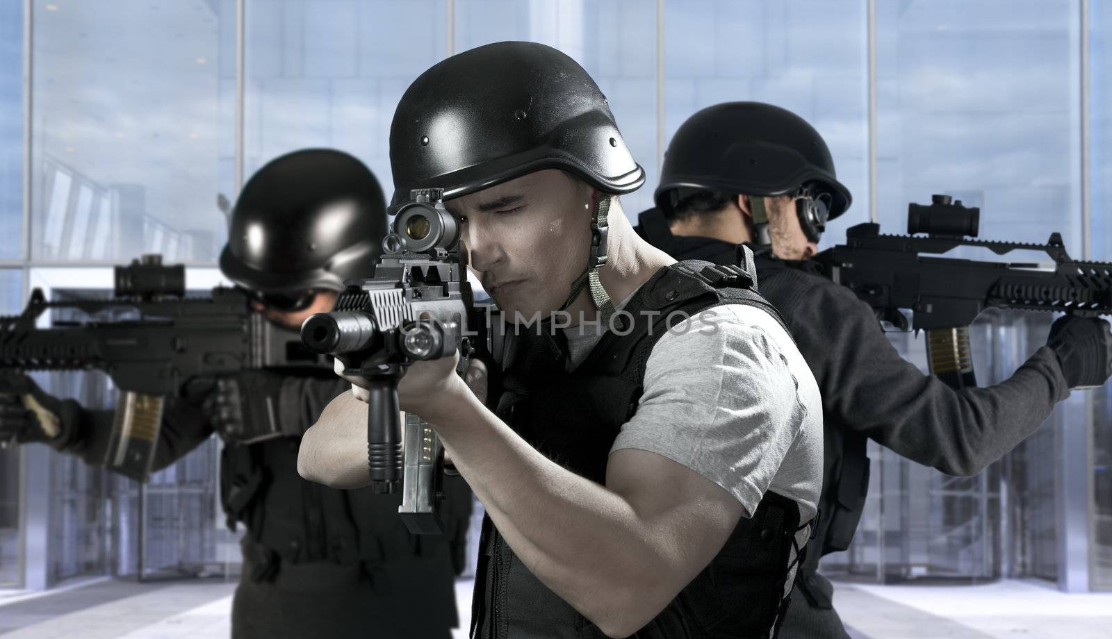 Police against terrorism, two soldiers at a business building by FernandoCortes