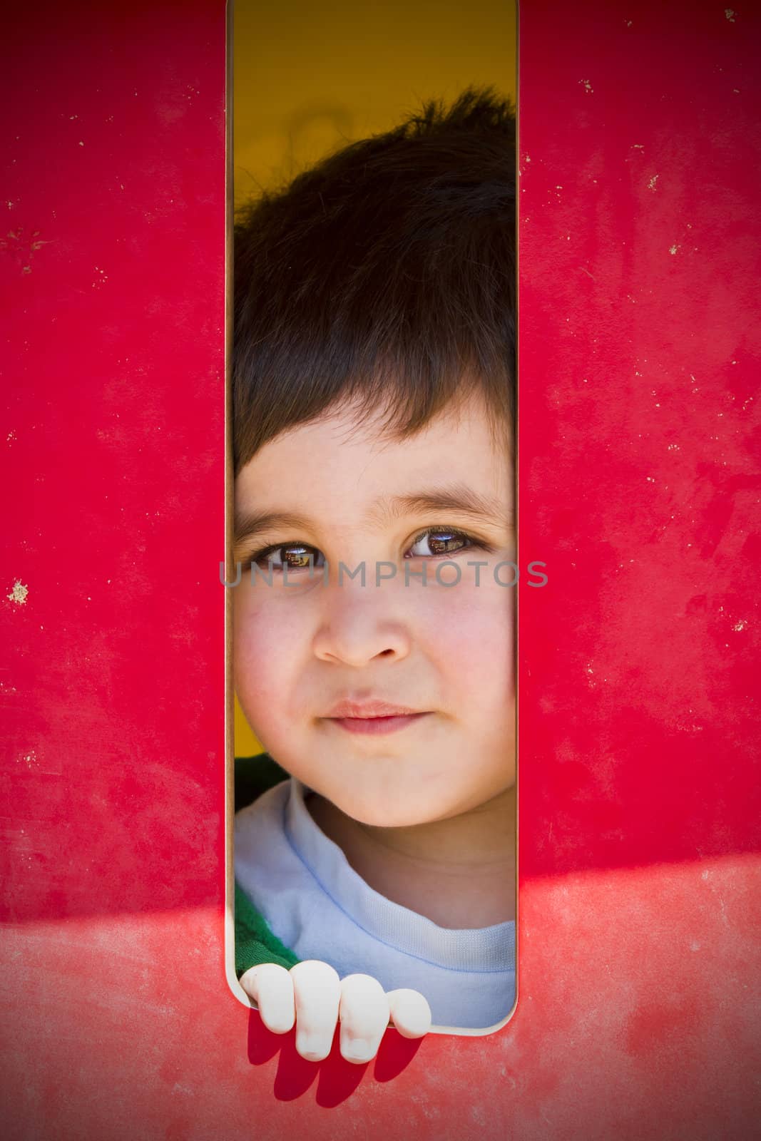 Baby playing in park, smilling, child in funny area by FernandoCortes