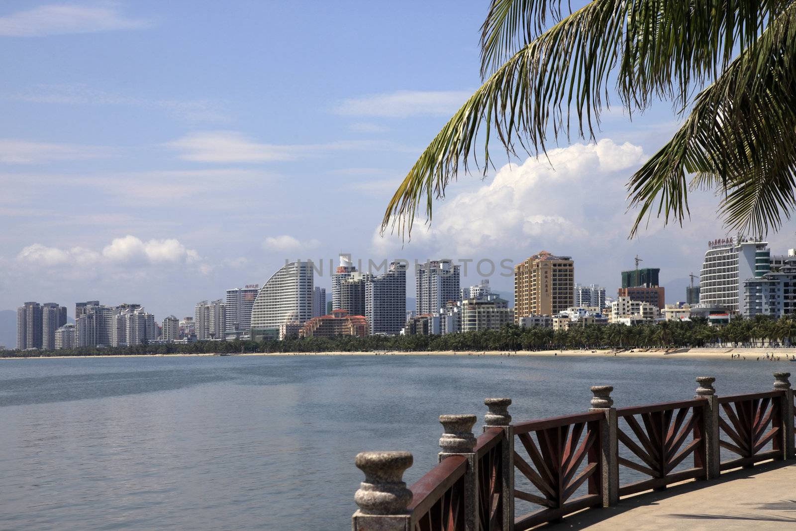 SANYA. CHINA: APRIL - 04, 2012. Canal with bridge on Jan. 12, 2008 in Sanya. It lies at the southern tip of Hainan Island. Located as of the Equator as Hawaii.