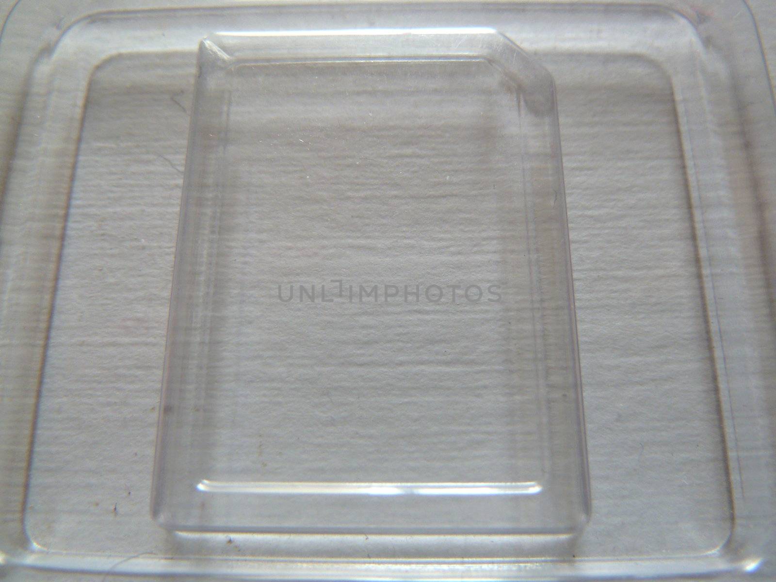 section of a transparent plastic object on white