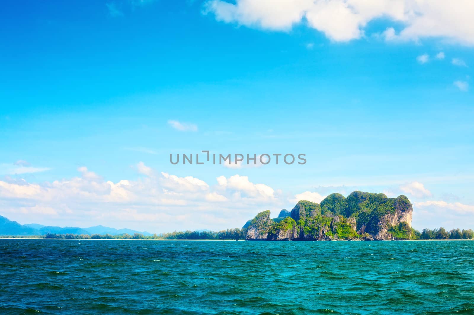 tall cliff with trees at Andaman Sea, Thailand