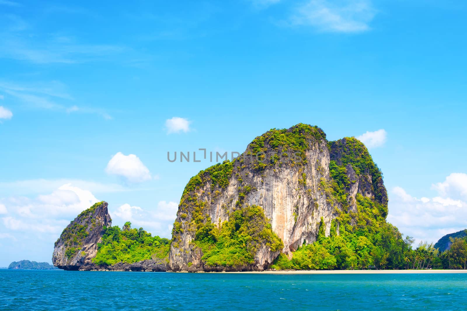 tall cliff with trees at Andaman Sea, Thailand