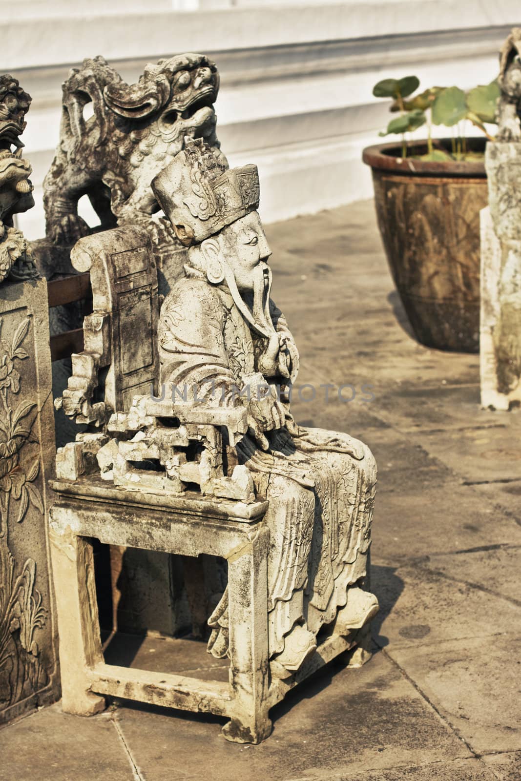 stone statue in Wat Arun, Bangkok, Thailand