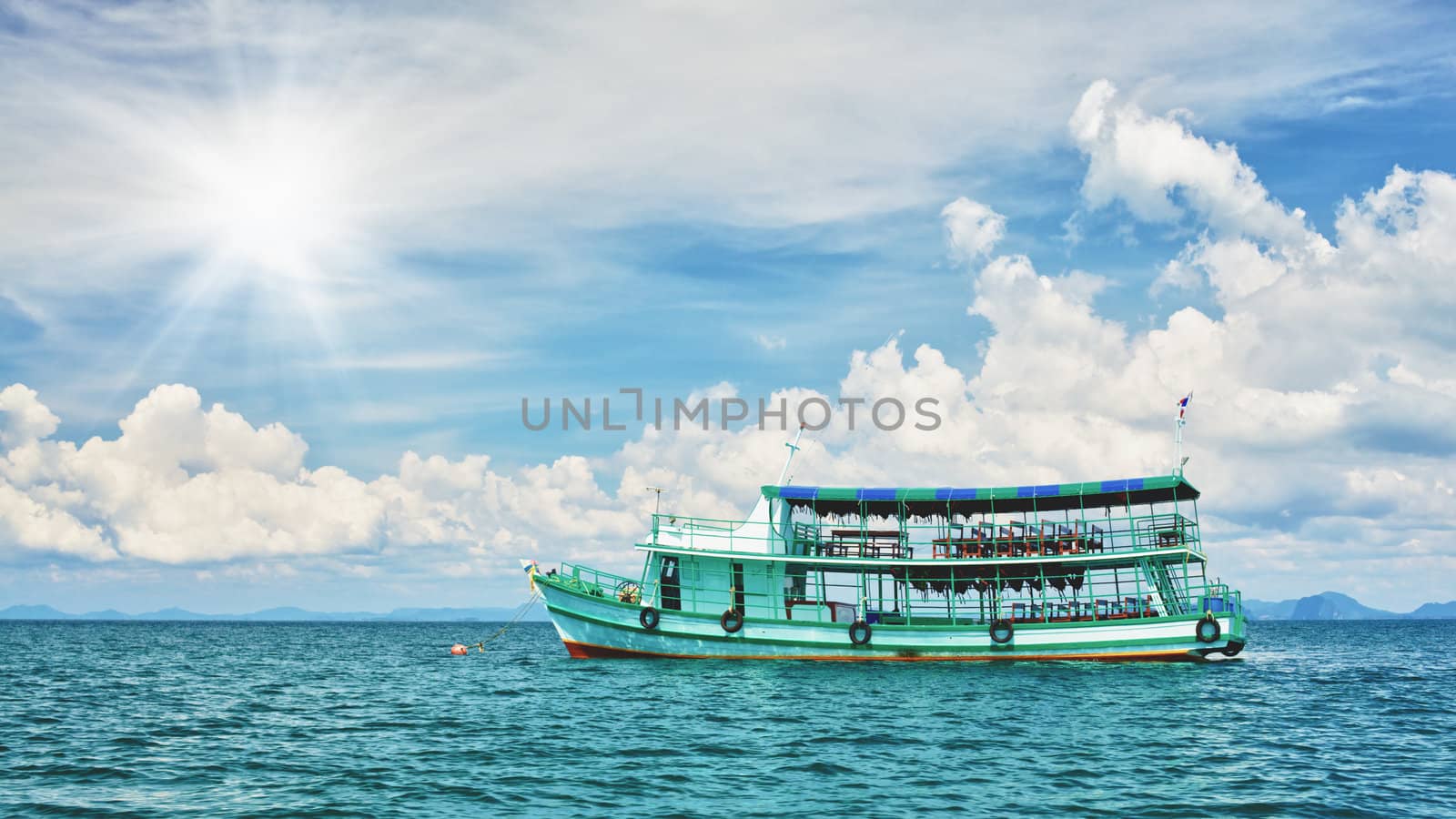 tour ferry at sunny day in Andaman Sea, Thailand