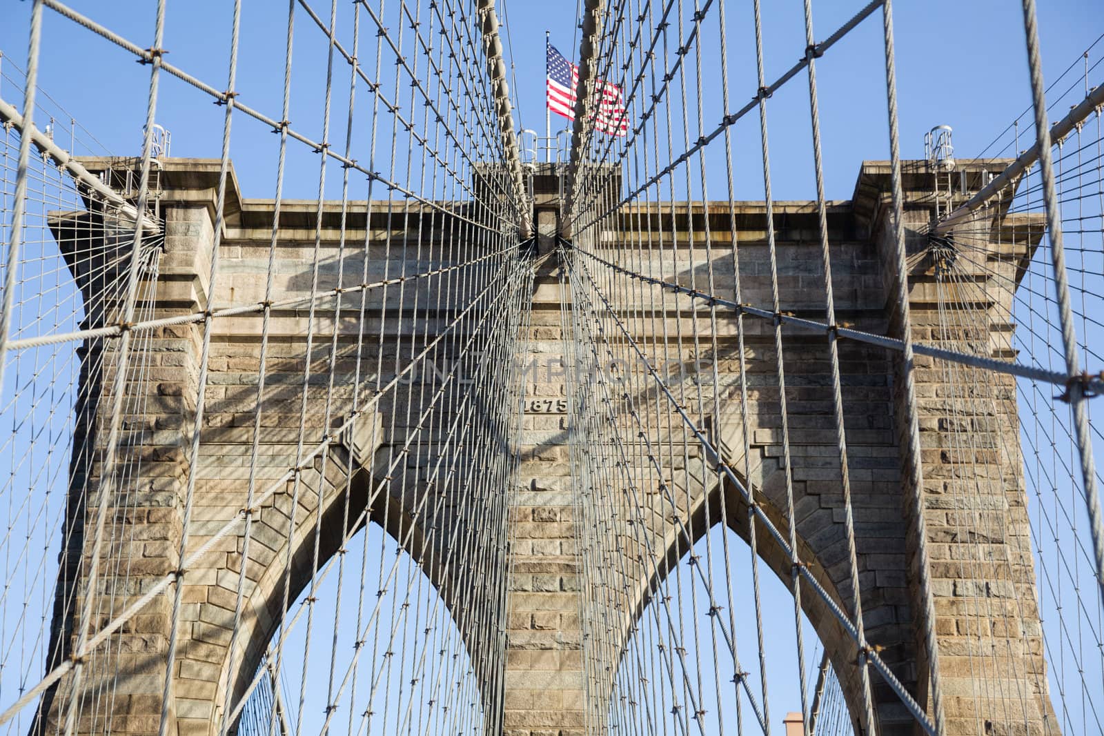 Detail of cables and wires on pier of Brooklyn Bridge in New York