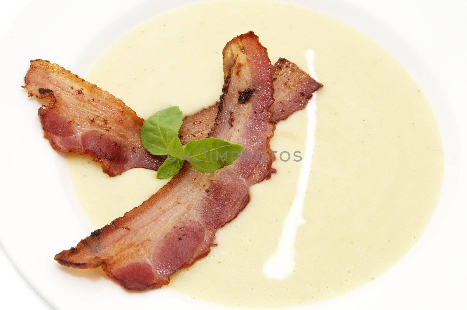 meal pea soup and bacon in a restaurant