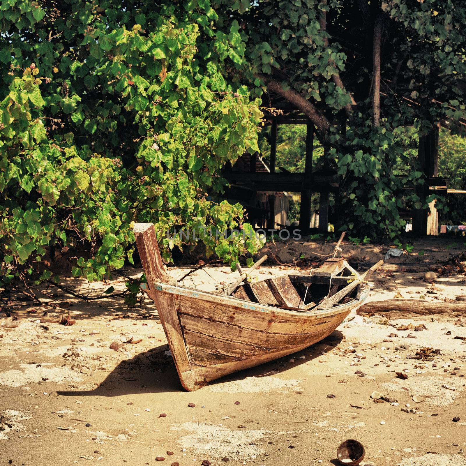 old fishing boat on coast, Koh Libong, Thailand