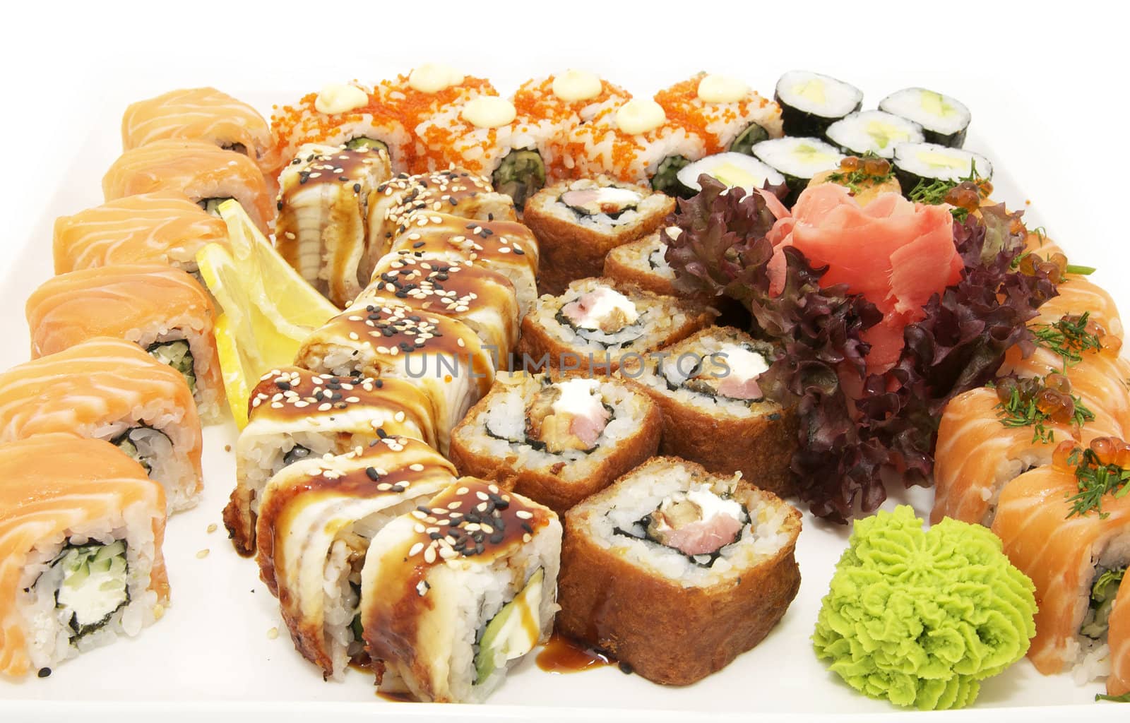 large assortment of sushi, fish and eggs at a Japanese restaurant