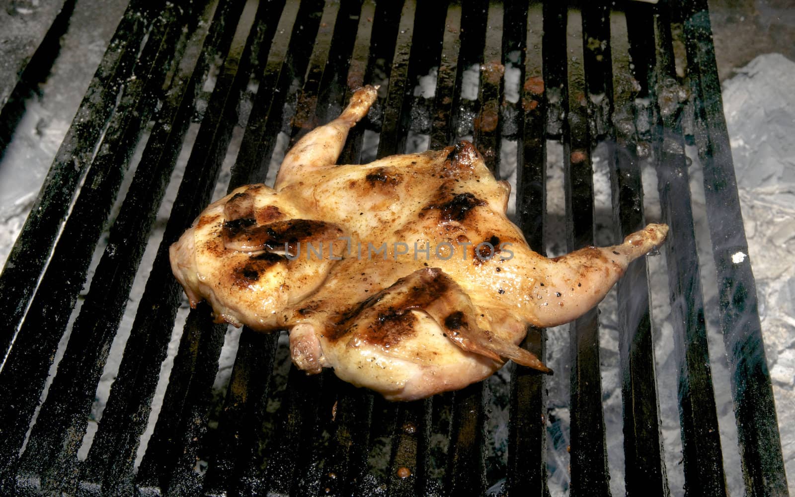 grilling poultry quails in a restaurant