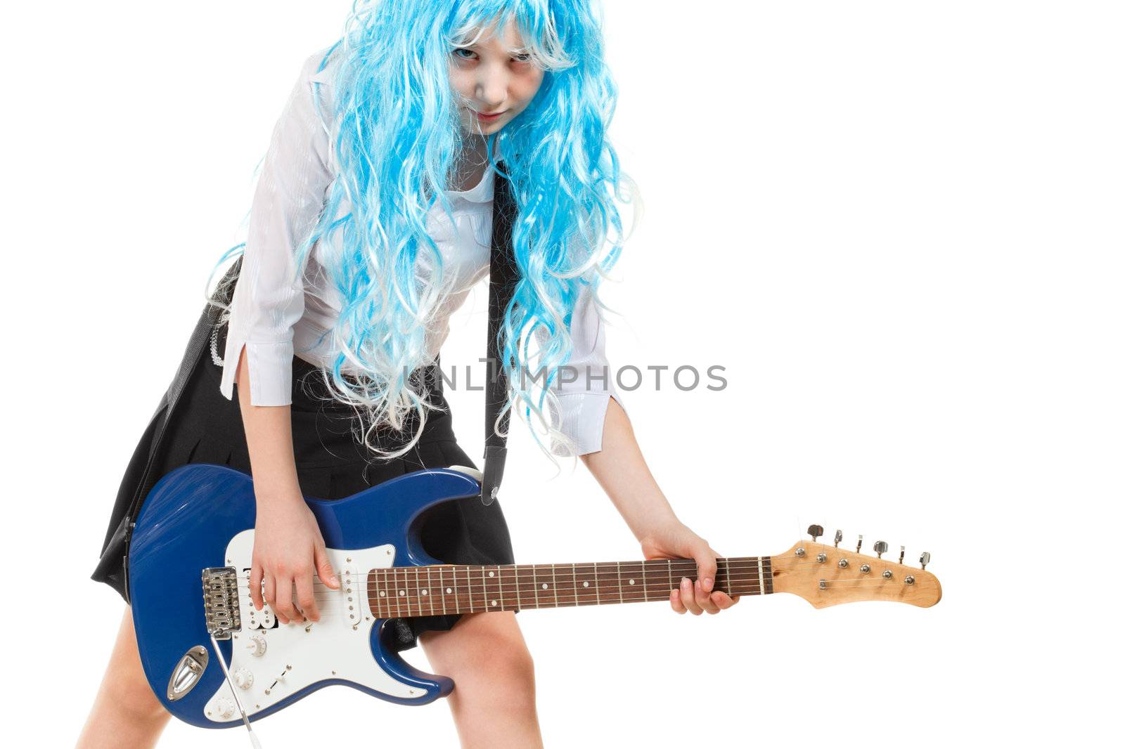 teen girl playing on a guitar, isolated on white