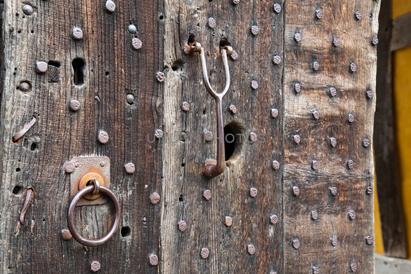Oak studded door at entrance to Stokesay castle in Shropshire